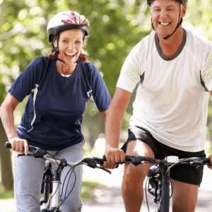 happy woman and man in their bicycle