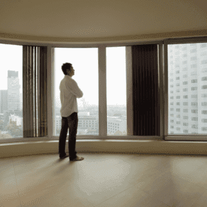 alone middle age man inside a big room